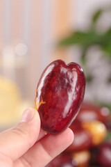 Fresh Ningxia Jujube Date Held in Hand - Premium Chinese Red Dates Studio Photography