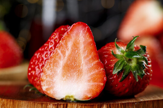 Fresh Dandong Strawberries Cut in Half Showing Juicy Red Interior Rich in Vitamins