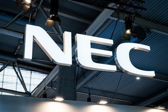 Barcelona, Spain - 02.03.2026: the Nec logo is seen at the Mobile World Congress or MWC, a trade show dedicated to telco and mobile technology