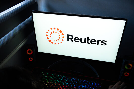 Punta Arenas, Chile &ndash; March 07, 2026: Reuters news agency corporate logo and orange circle emblem displayed on a bright computer monitor screen