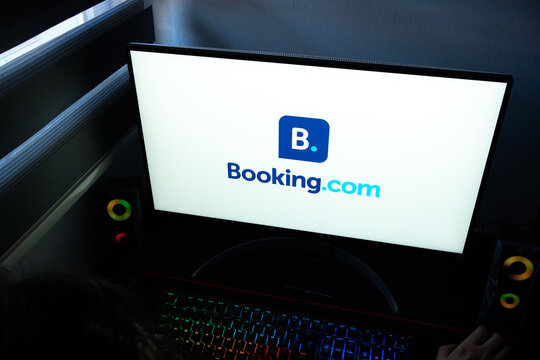 Punta Arenas, Chile &ndash; March 07, 2026: Blue Booking.com corporate logo and square icon displayed on a bright computer monitor screen