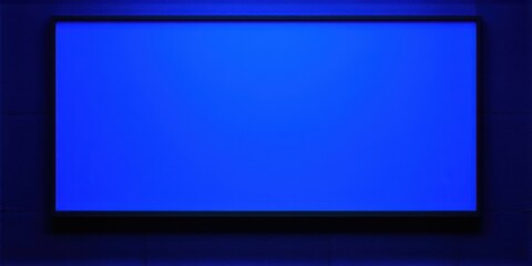 Rectangular blue screen dominates dark background. Subtle glow surrounds display, creating modern aesthetic. Minimalist composition.