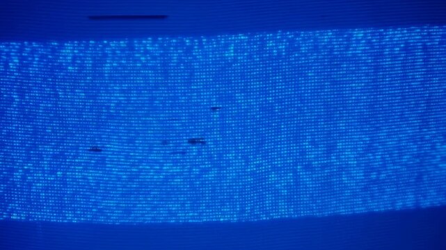 Abstract blue digital data visualization with glowing pixels. Represents technology, innovation, and the digital age