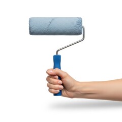 Obraz premium Hand holding a blue paint roller with a partially painted roller cover. isolated on white background