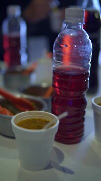 Mexican street food featuring cemita, charro beans, and hibiscus water