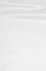 Obraz premium Smooth elegant white silk or satin luxury cloth texture as wedding background. Luxurious background design