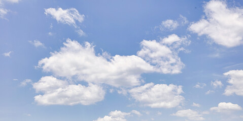Fototapeta premium Blue Sky with White Fluffy Clouds Natural Background