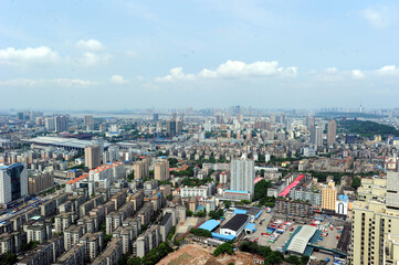 Obraz premium Aerial Cityscape After Rain with River and Urban Skyline
