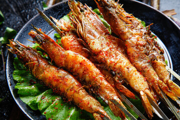 Grilled Prawn Skewers in Pan - Night Market Barbecue Food with Fresh Herbs