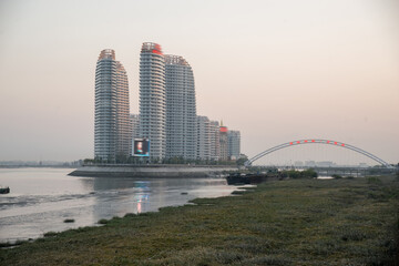 Dandong Skyline - Modern Architecture on Yalu River, Liaoning Province © DoThi