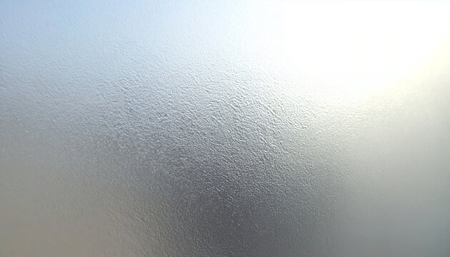 Fondo abstracto de textura met&aacute;lica plateada con reflejos sutiles y acabado mate o cepillado.