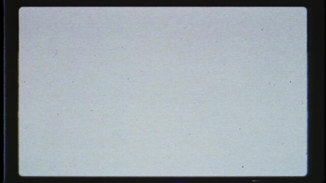 Super 8 film overlay texture with vintage noise dirt scratches and dust creating nostalgic 8mm cinematic frame effect for retro video transitions