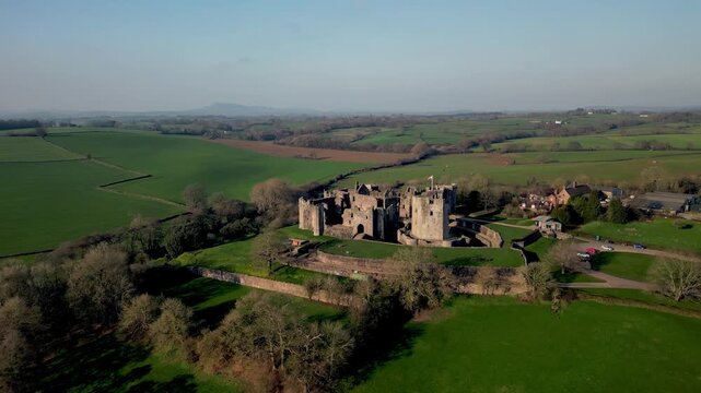 Medieval castle ruins in Wales, United Kingdom, drone flight