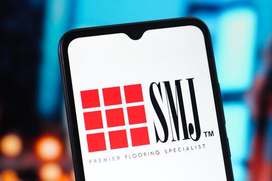 In this photo illustration, the SMJ International Holdings logo is seen displayed on a smartphone screen.