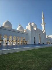 Sheikh Zayed Grand Mosque with white marble architecture and reflection pool