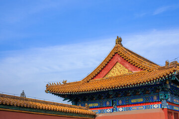 Fototapeta premium Ancient Chinese Temple Roof in Beijing with Golden Glazed Tiles