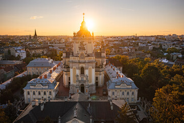 Fototapeta premium St. George's Cathedral in Lviv at Sunset Gold Hour Aerial View
