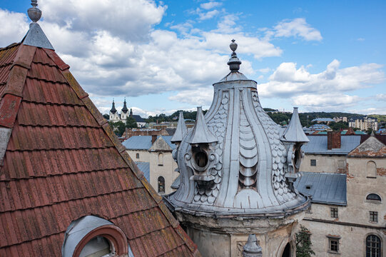 Detailed View of Historic Rooftops and Ornate Metal Dome in Lviv
