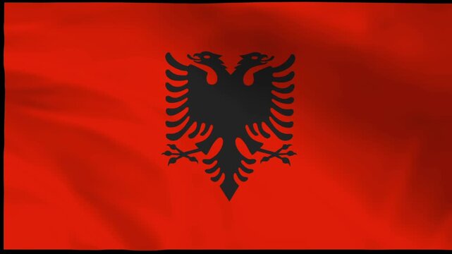 The Albanian flag waves proudly with its iconic black double-headed eagle symbol on a vibrant red background in this video