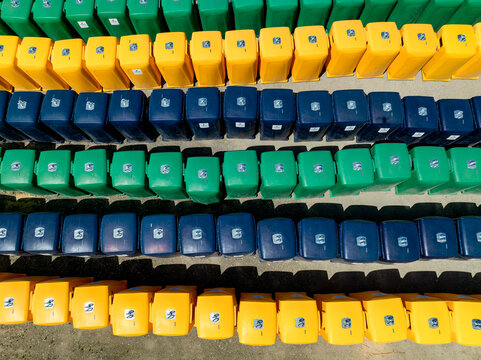 Aerial view of rows of multicolored stadium seating creating a vibrant, orderly pattern, Lisbon, Lisbon, Portugal.