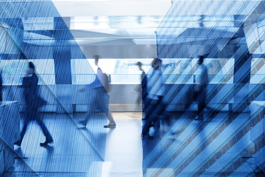 Double Exposure Business People Walking in Modern City &ndash; Urban Corporate Concept	