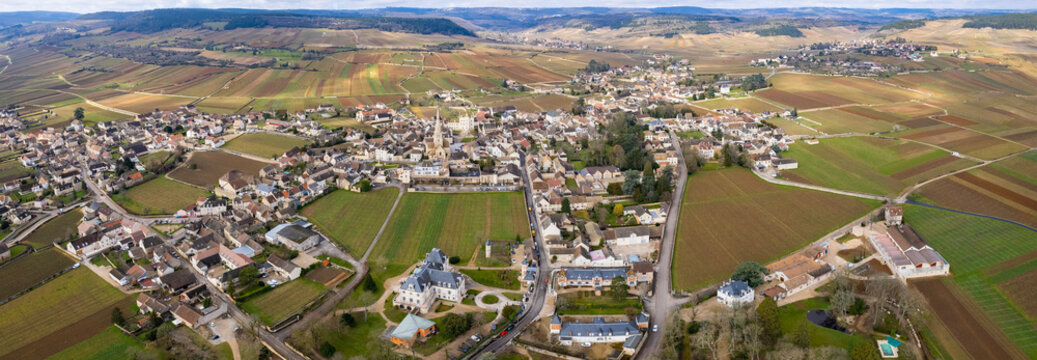 Aerial panorama view beside the old town around the city Meursault in France on a sunny autumn day. 