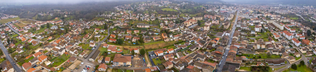 Obraz premium Aerial panorama view beside the old town around the city Ambérieu-en-Bugey in France on a cloudy spring day. 