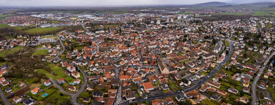 Aerial view of the old town of the city Molsheim in France on a cloudy afternoon in early spring.