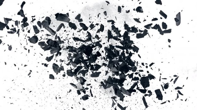 Super Slow Motion Flying and Colliding Charcoal Isolated On White Background at 1000 fps.