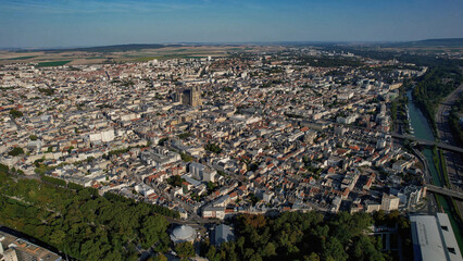Fototapeta premium Aerial panoramic view above the old town around the city Reims in France on a sunny summer day. 