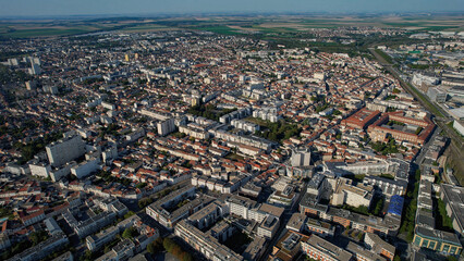 Obraz premium Aerial panoramic view above the old town around the city Reims in France on a sunny summer day. 