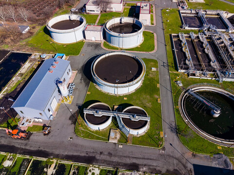 Water treatment facility processes wastewater and manages biosolids at a large industrial site during daylight hours