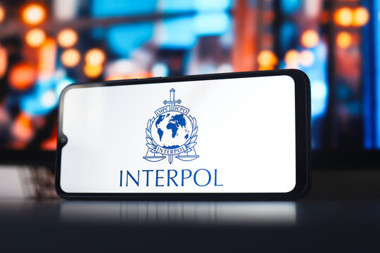 The International Criminal Police Organization (Interpol) logo is displayed on a smartphone screen in this photo illustration in Ontario, Canada, on March 4, 2026