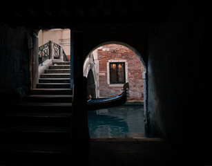 archway and gondola in venice italy © Agata Kadar
