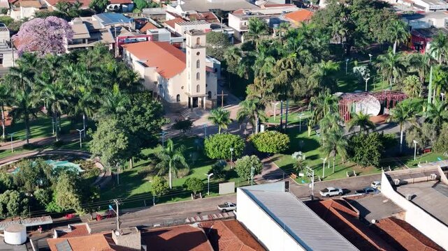 Cassilandia, Mato Grosso do Sul, Brazil - 04 05 2024: Drone approaching Sao Jose church tower