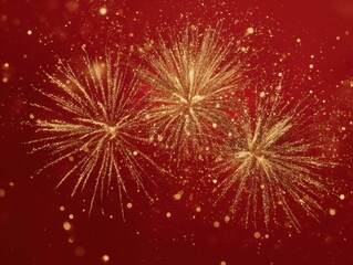 Obraz premium gold glitter fireworks burst close up isolated on a red background