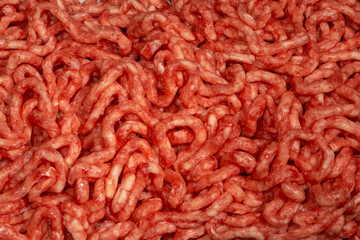 Raw minced beef close-up, top view.