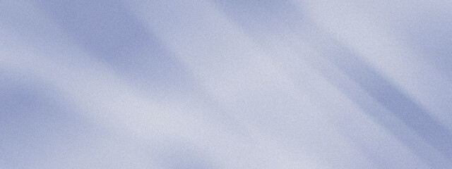 Obraz premium Soft abstract blue textured background with gentle gradients and subtle diagonal shadows, suitable for banner or poster design