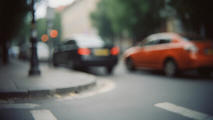 Fototapeta premium Cars Navigating a Busy City Street During a Cloudy Afternoon, Capturing the Energy of Urban Life Filled With Movement and Anticipation Generative AI
