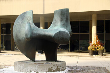 Naklejka premium Toronto, Canada - February 15, 2026: The Archer sculpture by Henry Moore at Toronto City Hall, abstract bronze public art from the 1960s