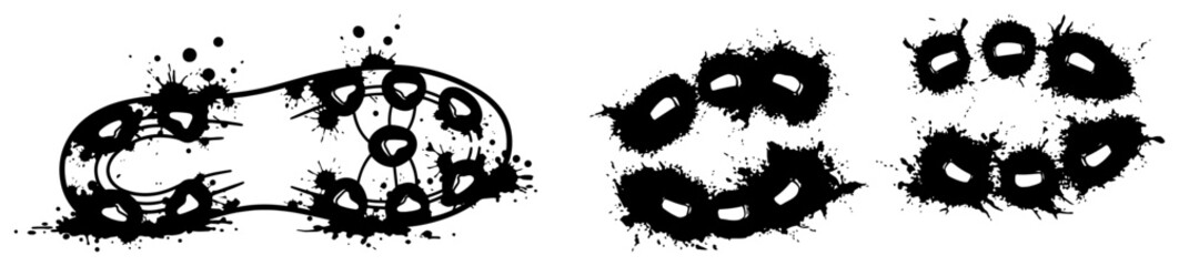 Grungy soccer shoe footprints with ink splatters and mud texture © Logan