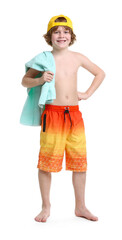 Cute little boy in beachwear with terry towel on white background