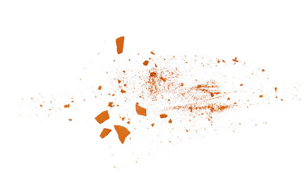Crushed and broken red brick, dust scattered flying, explosion isolated on white background, clipping path, design element