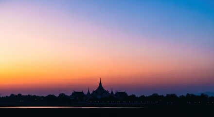 Naklejka premium silhouette temple at sunset