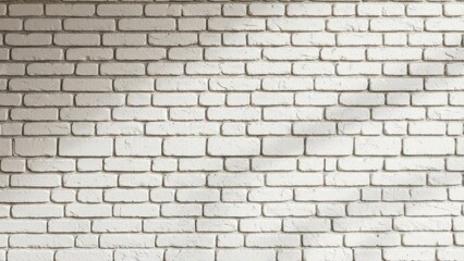 Fototapeta premium Close-up of a white brick wall, showing texture and shadows