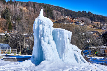Beautiful ice sculpture with large icicles, detail. 