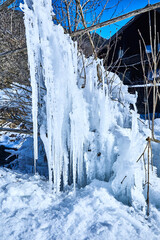 Beautiful ice sculpture with large icicles, detail. 
