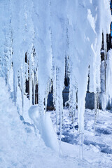Beautiful ice sculpture with large icicles, detail. 