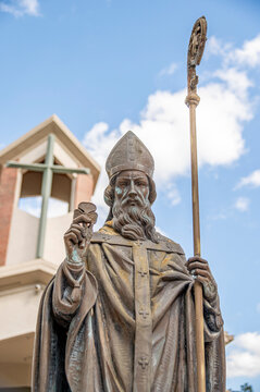 St Patrick with church in the background