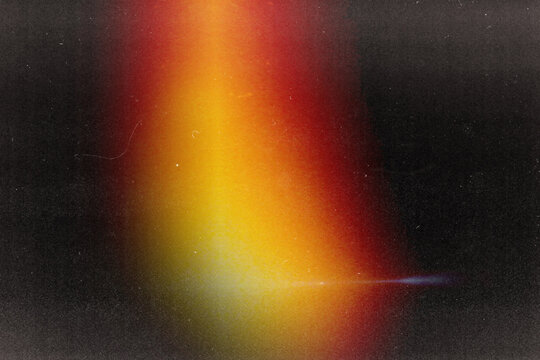 Vintage center light leak overlay with red, orange, and yellow glow. Heavy film dust, scratches, and grain on dark background. Retro cinematic burn effect with subtle blue lens flare streak.